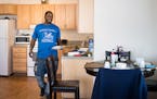 Detrick Cheairs, above, said he and his 7-year-old daughter, De'Liyah, "are so blessed" to have moved into Minneapolis' Hawthorne EcoVillage.