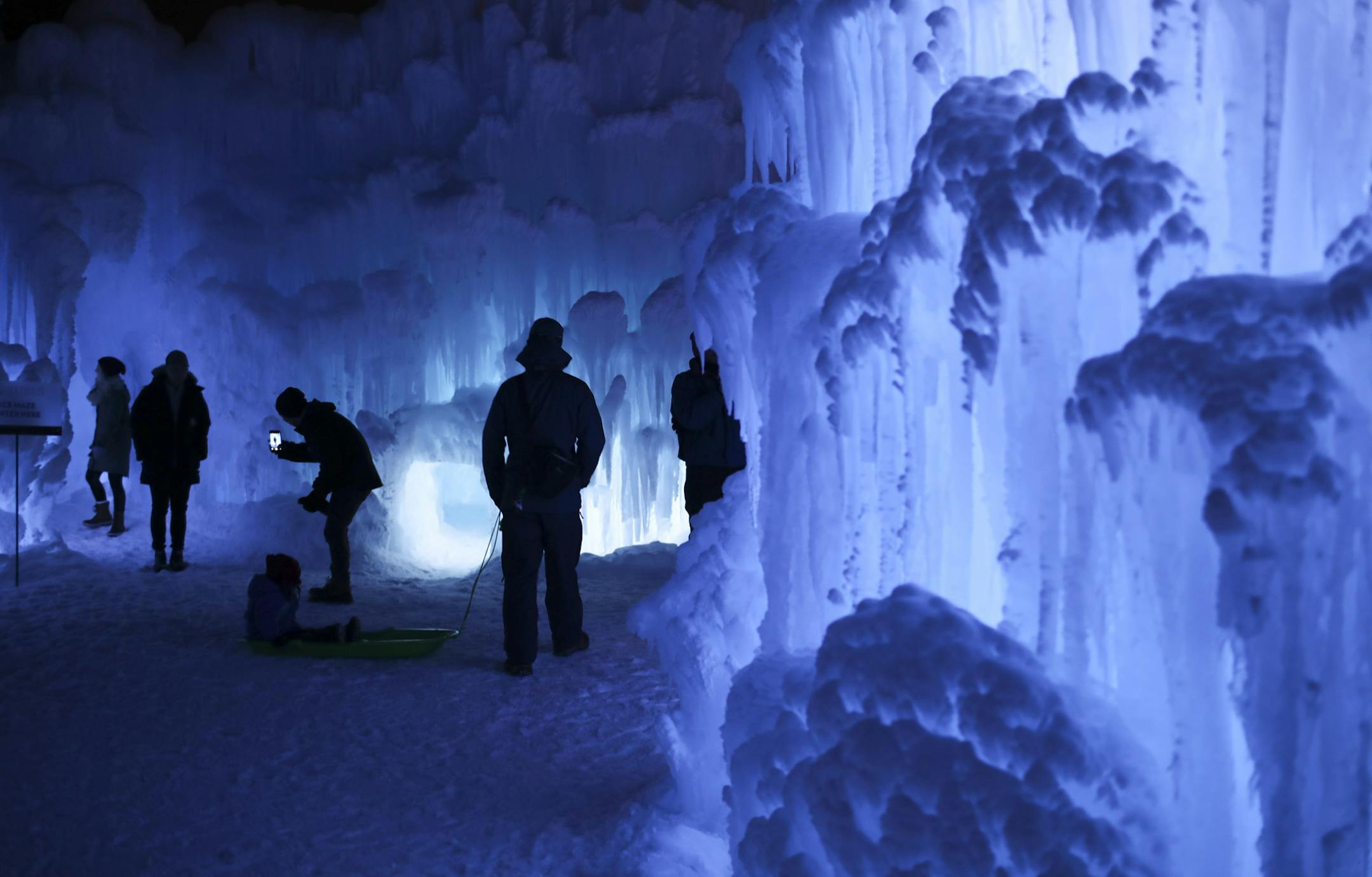 Visitors inside the Ice Castles at the Lift Bridge Sunday night. ] JEFF WHEELER &#xef; jeff.wheeler@startribune.com The town of Stillwater is hosting Ice Castles at the Lift Bridge in Lowell Park from now until as late as March, depending on the weather. The frozen spectacle is open daily afternoons and evenings, except Tuesdays.