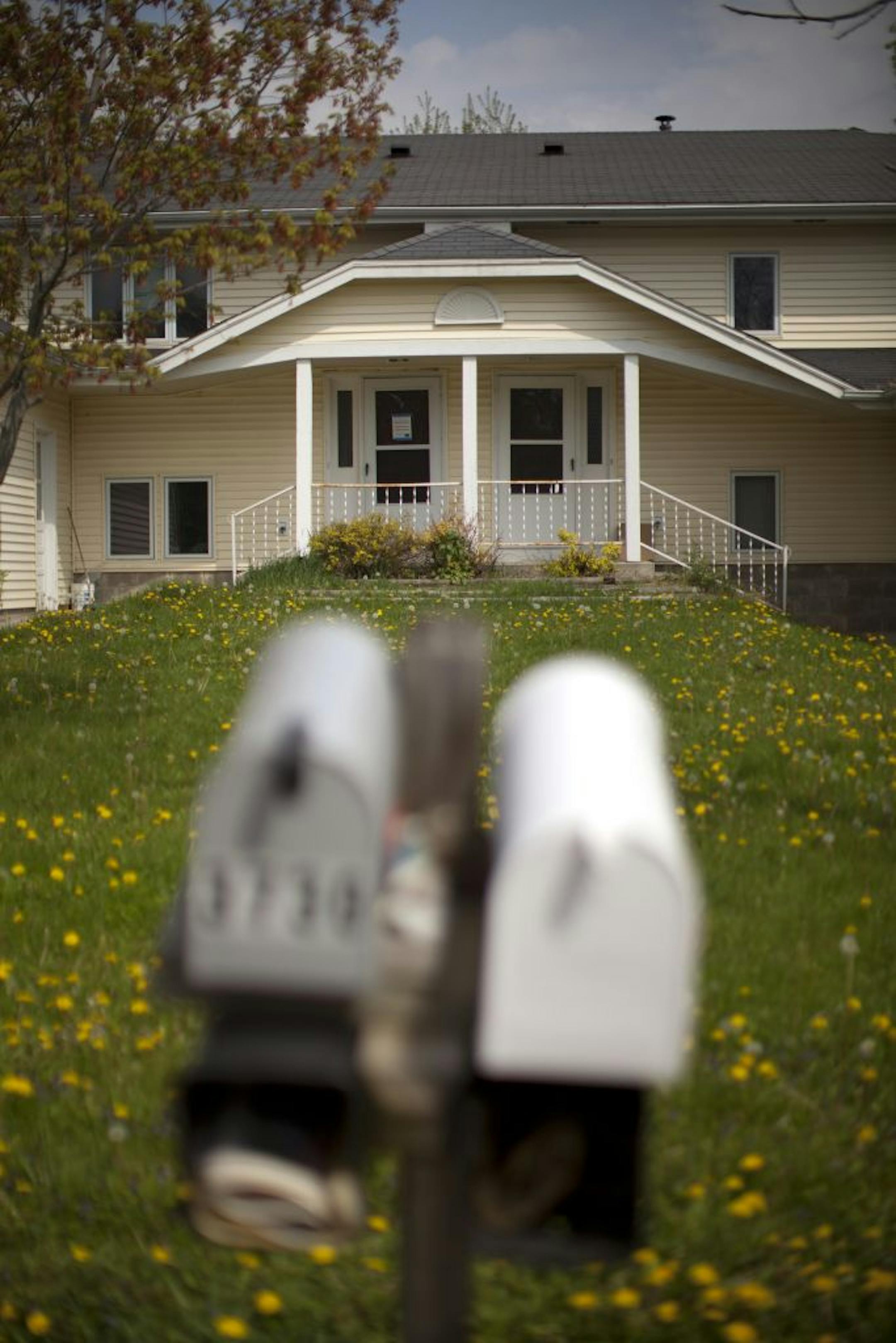 Seventeen people lived in this St. Bonifacius duplex that was also stuffed with rotting food, dead animals and garbage. One neighbor said he hopes the city will now buy the home, tear it down and add the land to an adjacent park.