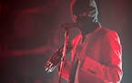 Tyler Joseph sang and played tambourine with Twenty One Pilots at the Xcel Energy Center on Friday. ] Isaac Hale ï isaac.hale@startribune.com Twenty 