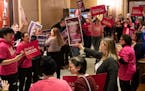 Protesters on both sides of the abortion debate faced off outside the Minnesota House chamber before a floor vote Jan. 19.