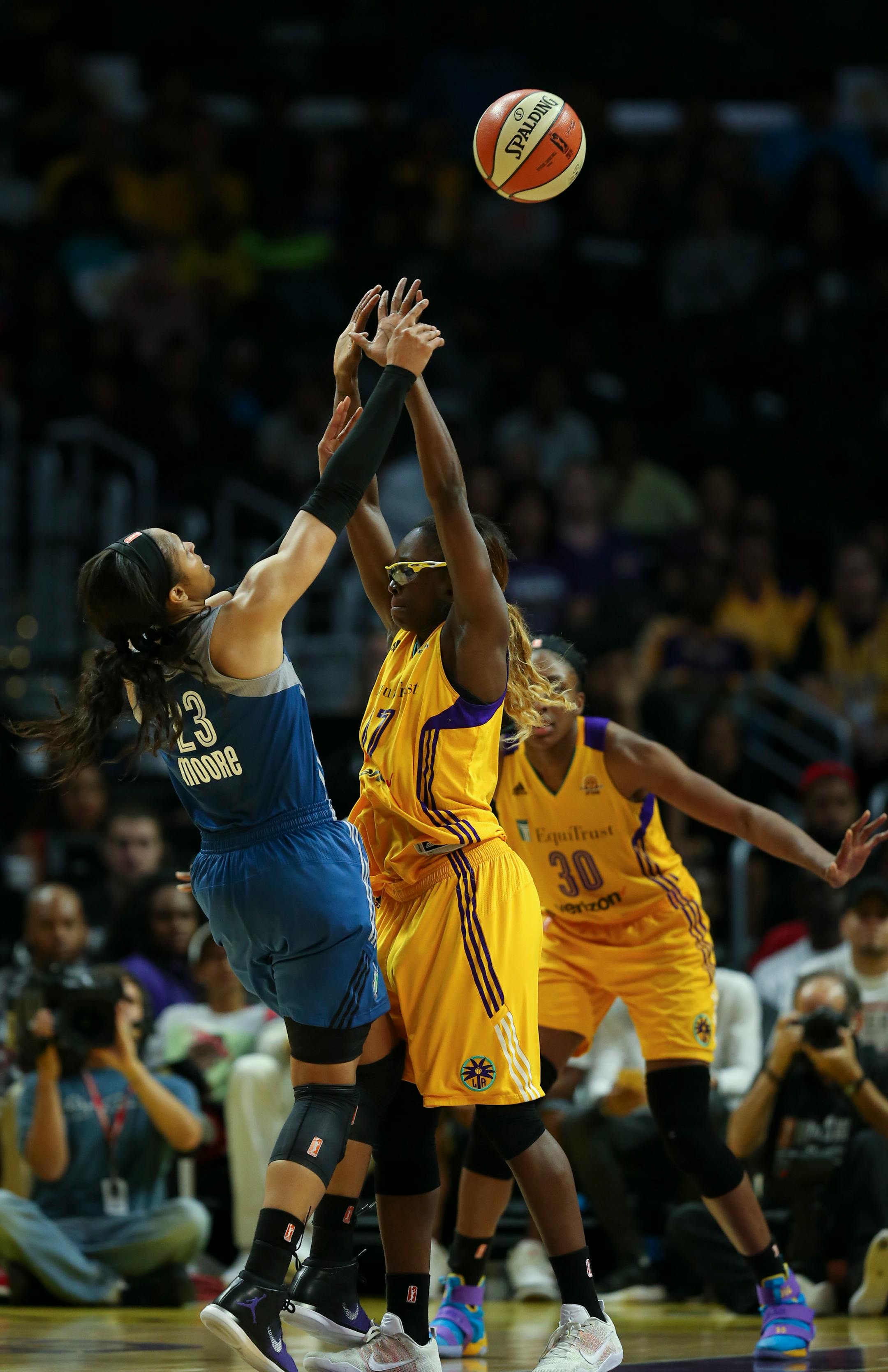 Minnesota Lynx forward Maya Moore (23) shot over Los Angeles Sparks forward Essence Carson (17) as she was fouled in the fourth quarter.