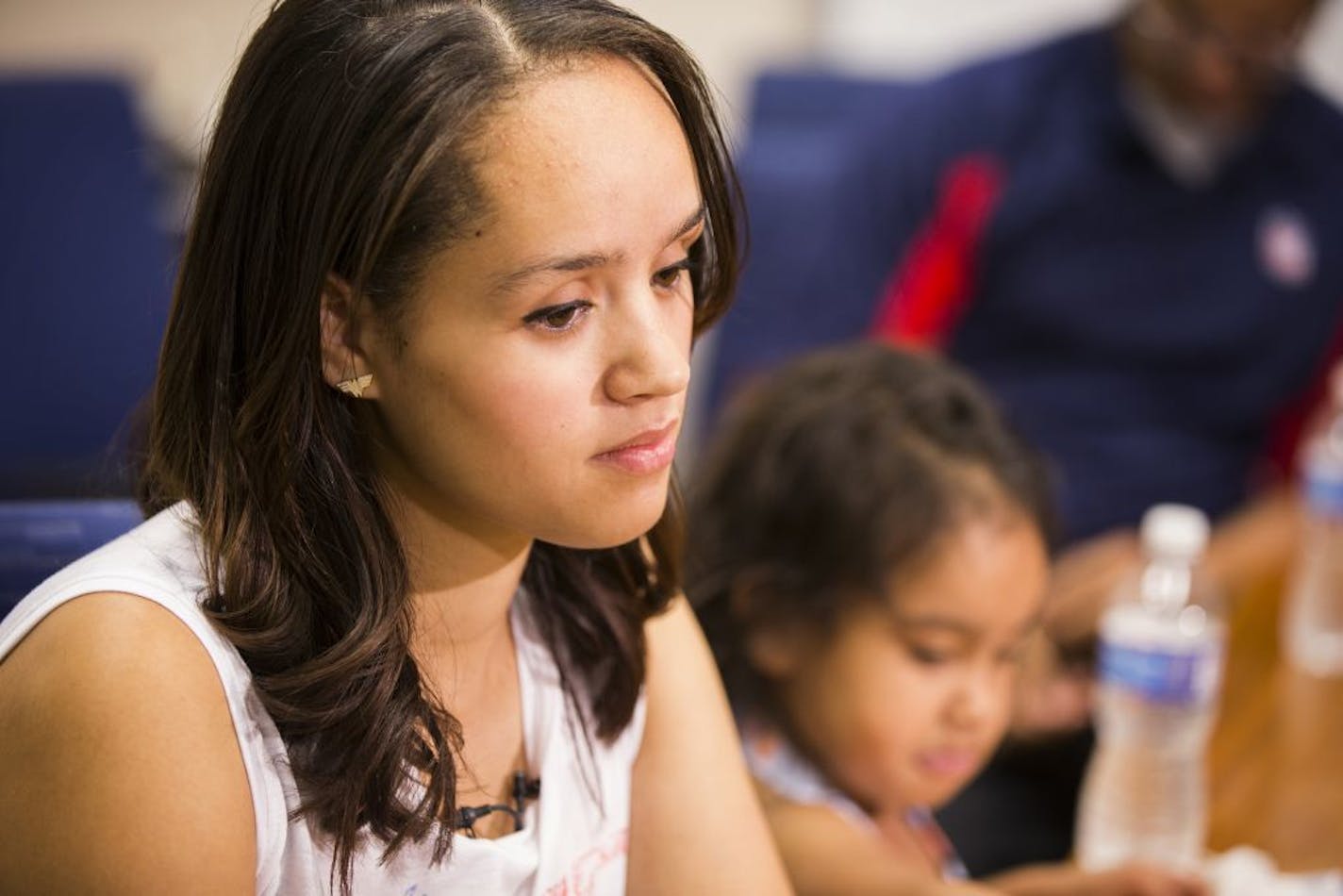 Shandrea Spielman, 22, talks to the media at the Minneapolis Police Department headquarters in Minneapolis on Friday, June 26, 2015.
