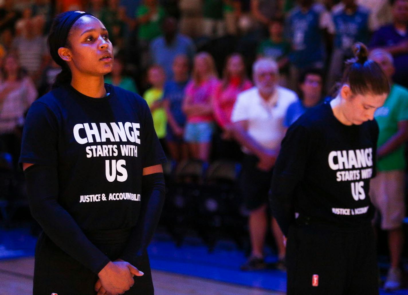 Minnesota Lynx players Maya Moore and Lindsay Whalen observed a moment of silence for Philando Castile on Saturday.