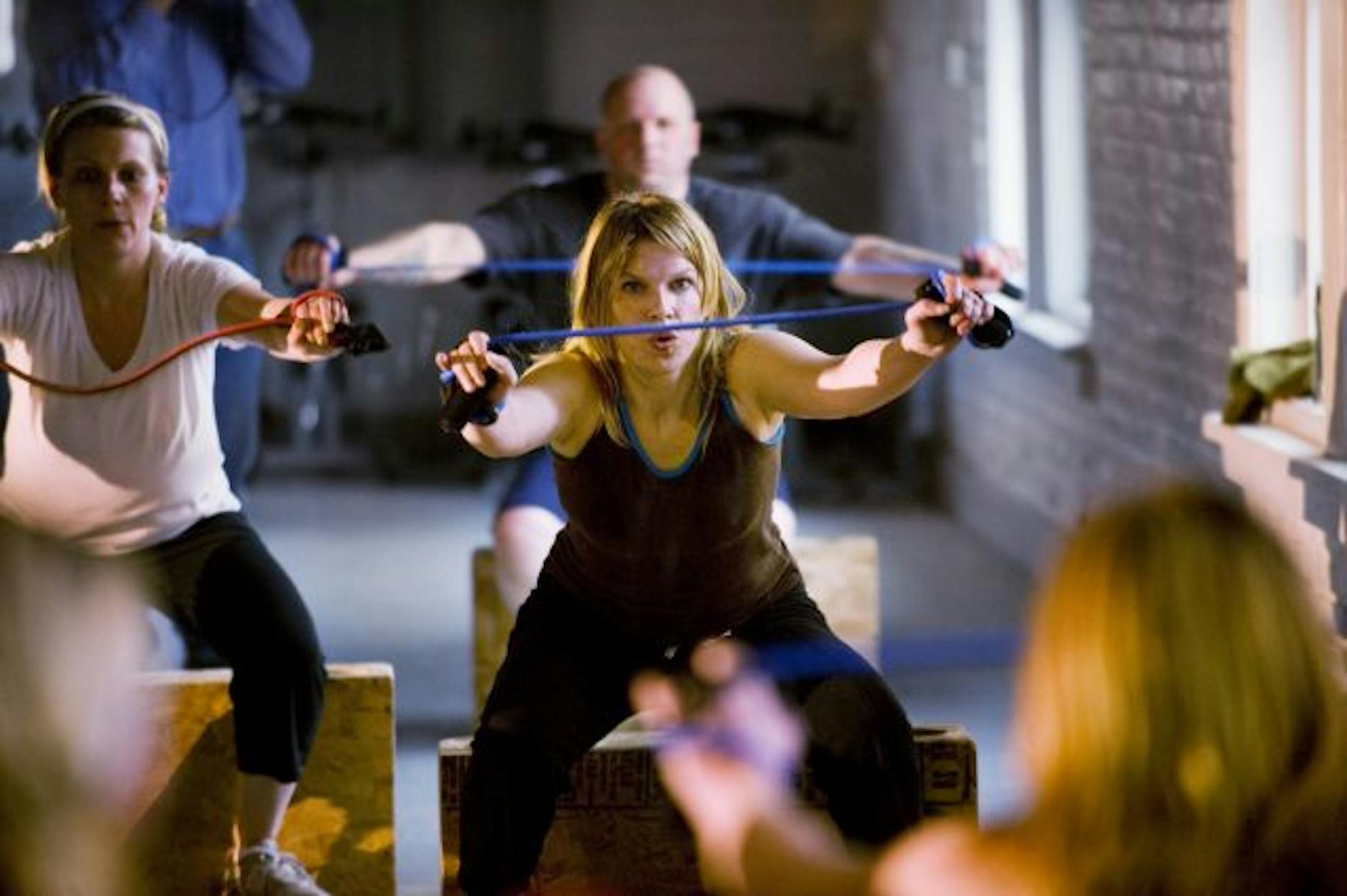 Julie Kucinski in a boot camp fitness class at The Shed Fitness Center on Lyndale Ave. in Minneapolis.