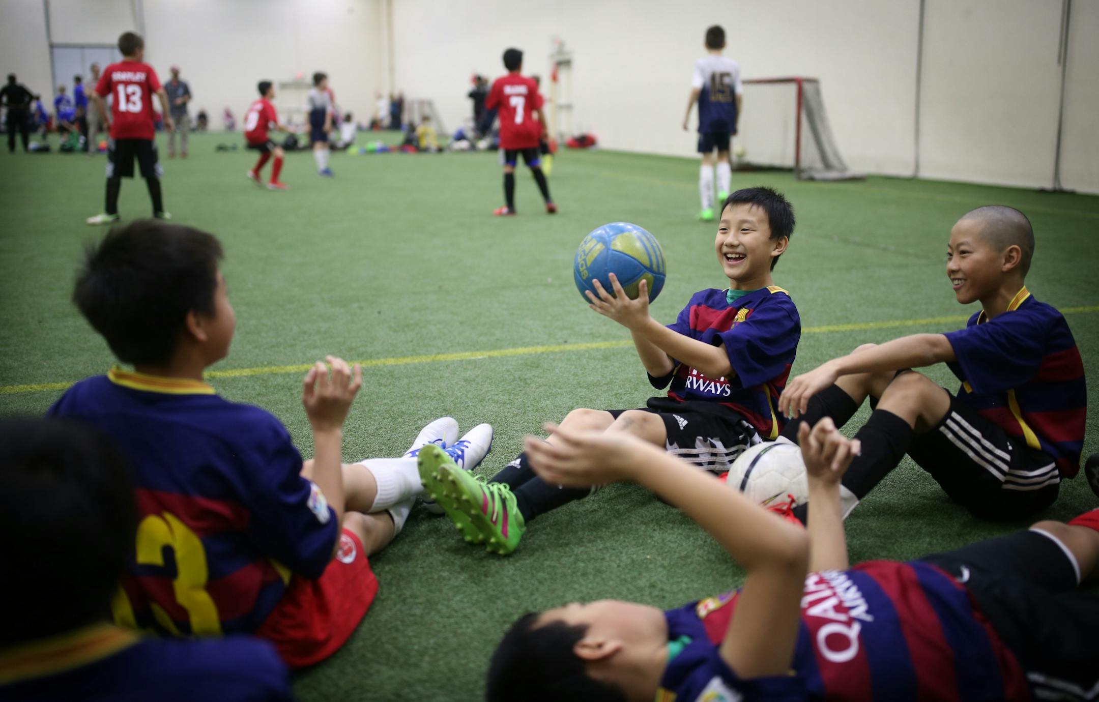 Saulye Thor left, and Kenji Moura members of Generation X boys 11U/12U/ waited their turn to play in the Four Score soccer tournament at the National Sports Center Sunday February 19, 2017 in Blaine, MN.