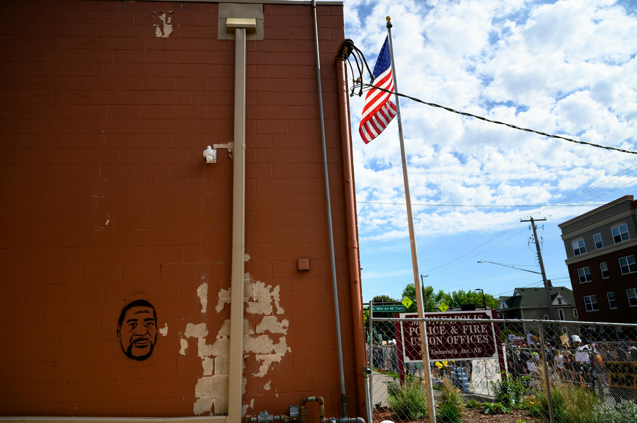 A stencil portrait of George Floyd, painted on the back of the Minneapolis Police and Fire Union Offices. ]
aaron.lavinsky@startribune.com Protesters took part in a "Bob KKKroll Must Go!" rally against the Minneapolis Police Union and its president outside the union headquarters on Friday, June 12, 2020 in Minneapolis, Minn.