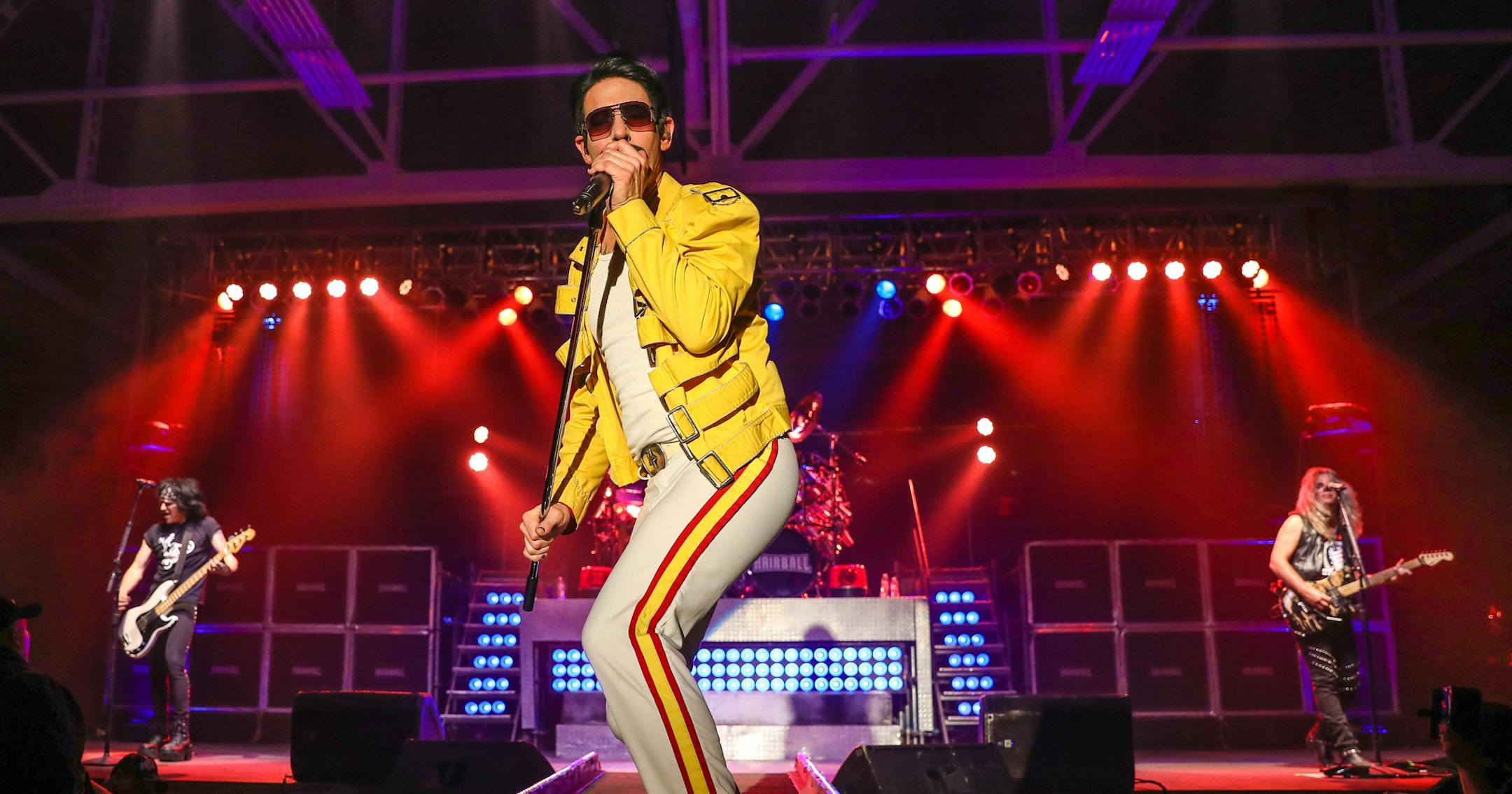 Kris Vox plays Freddie Mercury in the band Hairball.