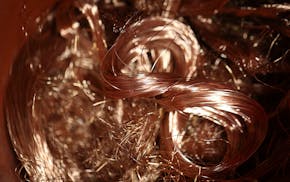 Bryan Korbel showed off old electronics, including copper wiring, he breaks down to scrap and precious metals, which has become a way for him to finan