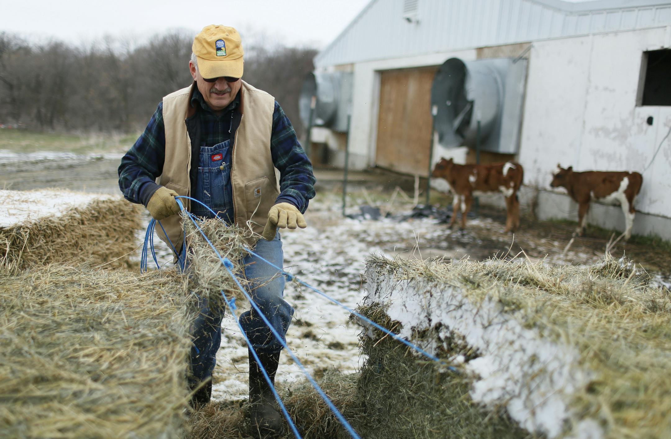 Dave Minar at work on his New Prague farm in April 2014.