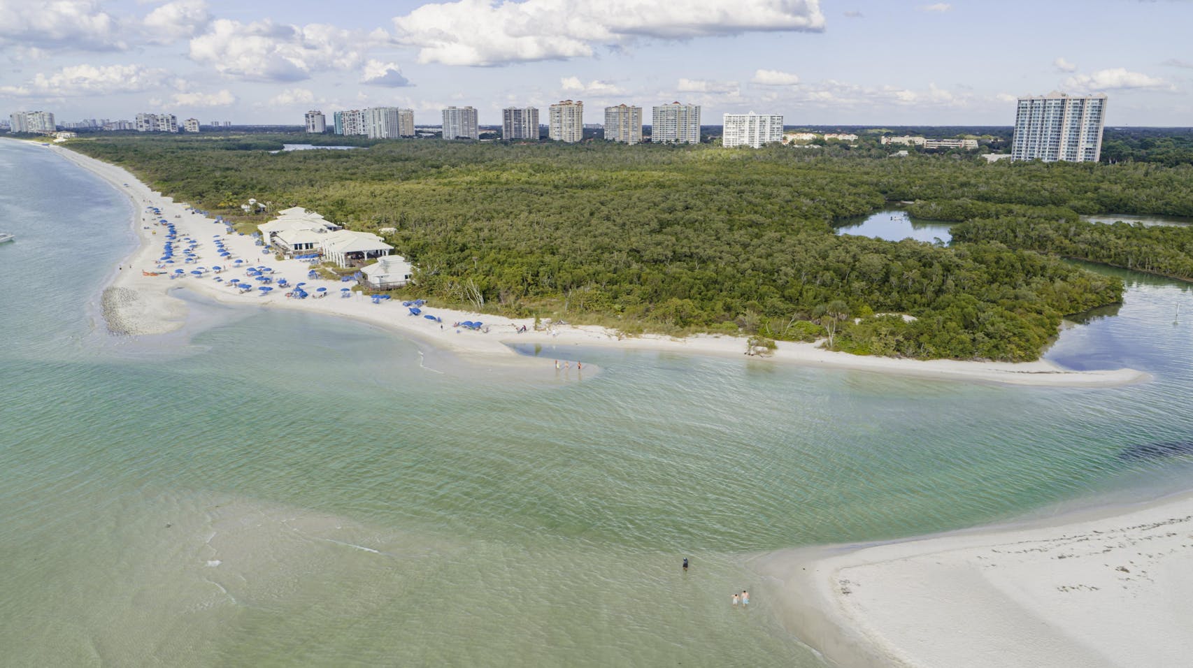 The best beach in Naples is at Clam Pass Park, accessed via a free golf cart shuttle.