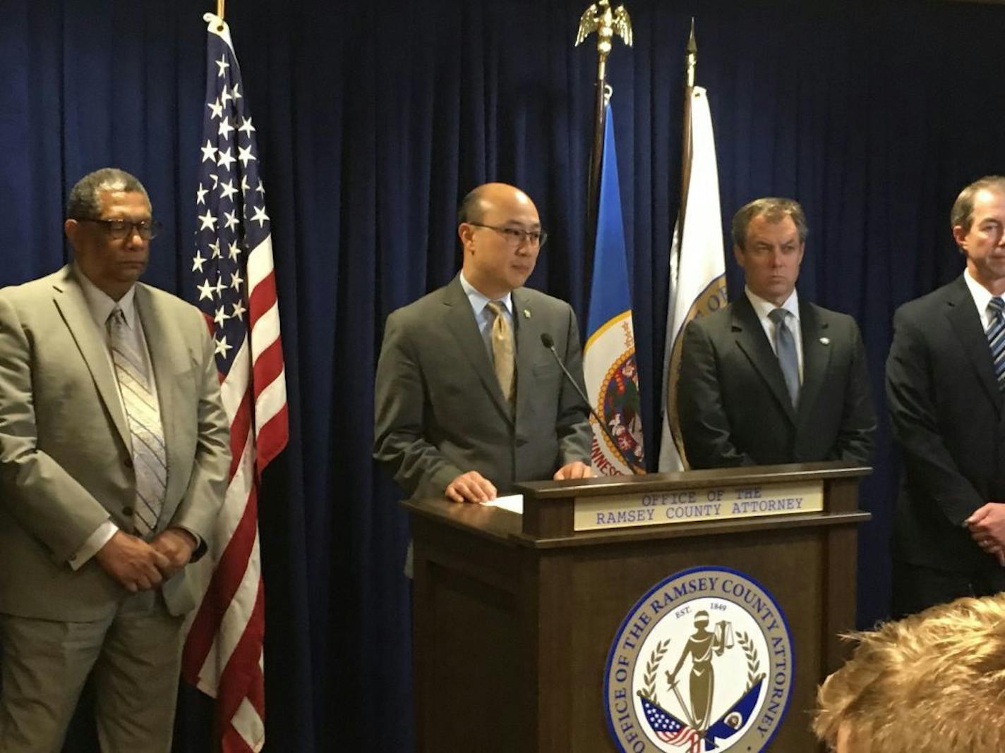 Ramsey County Attorney John Choi, at podium, spoke at a press conference following the not guilty verdict for police officer Jeronimo Yanez in the shooting death of Philando Castile. credit: Matt Gillmer