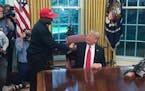In this file photo, President Donald Trump meets with rapper Kanye West in the Oval Office of the White House in Washington, D.C, on Oct. 11, 2018. (S