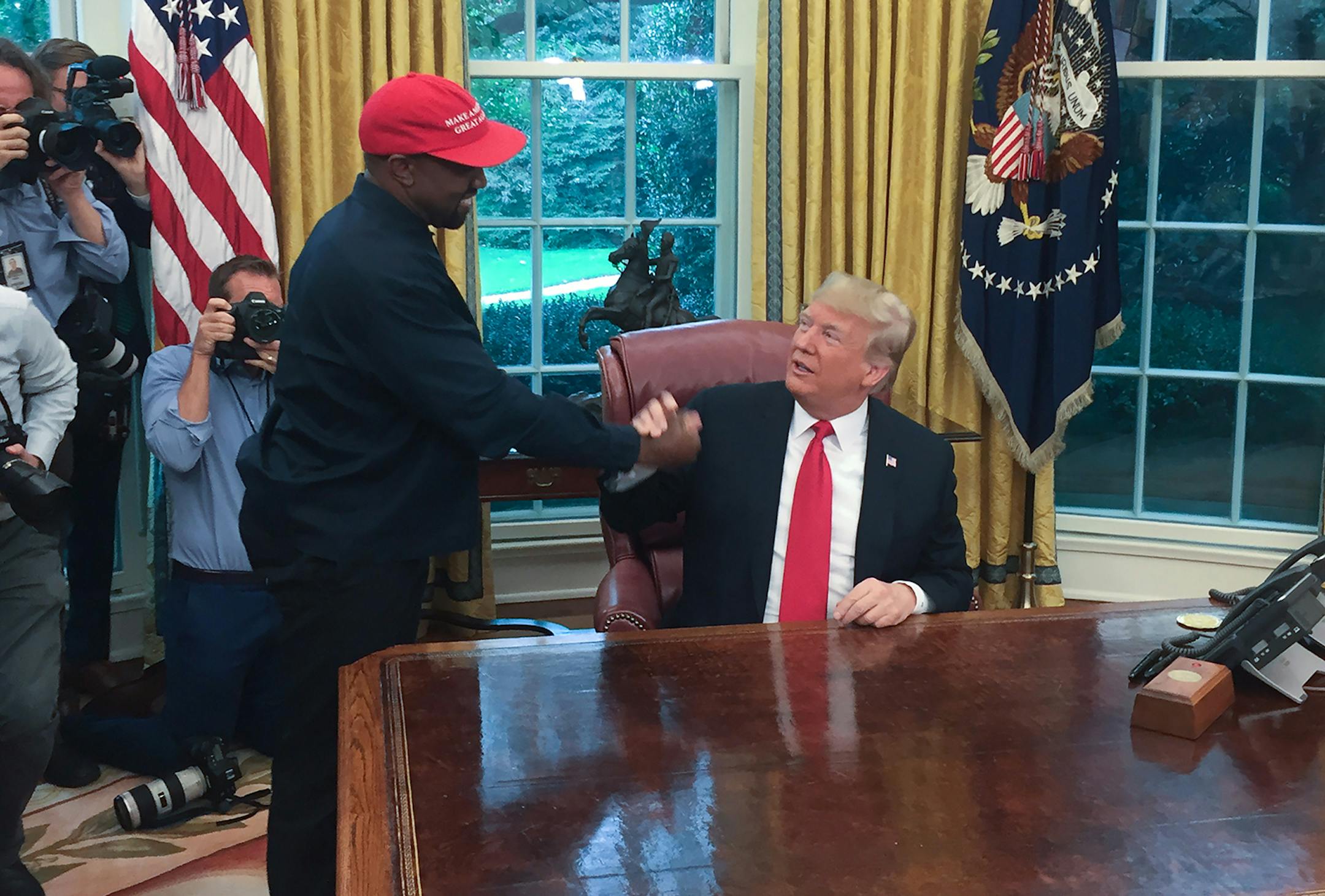 In this file photo, President Donald Trump meets with rapper Kanye West in the Oval Office of the White House in Washington, D.C, on Oct. 11, 2018. (Sebastian Smith/AFP via Getty Images/TNS) ORG XMIT: 64736367W