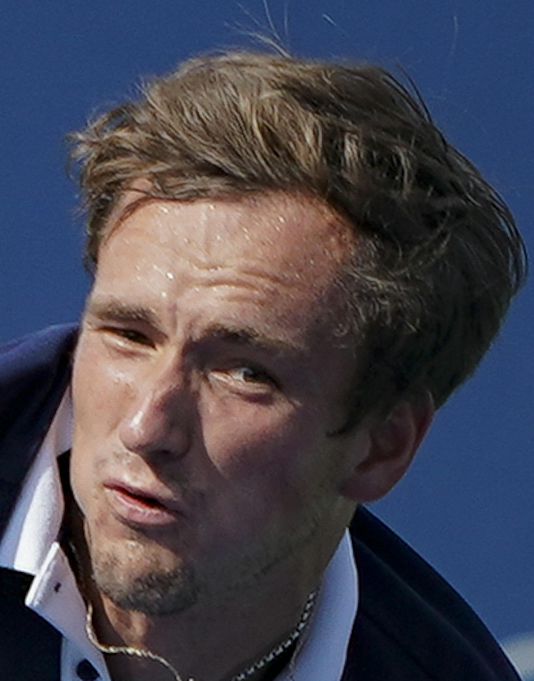 FILE - In this Aug. 18, 2019, file photo, Daniil Medvedev, of Russia, serves to David Goffin, of Belgium, in the men's final match during the Western & Southern Open tennis tournament in Mason, Ohio. Medvedev heads to the U.S. Open ranked a career-high fifth after reaching the finals of his past three tournaments. (AP Photo/John Minchillo, File)