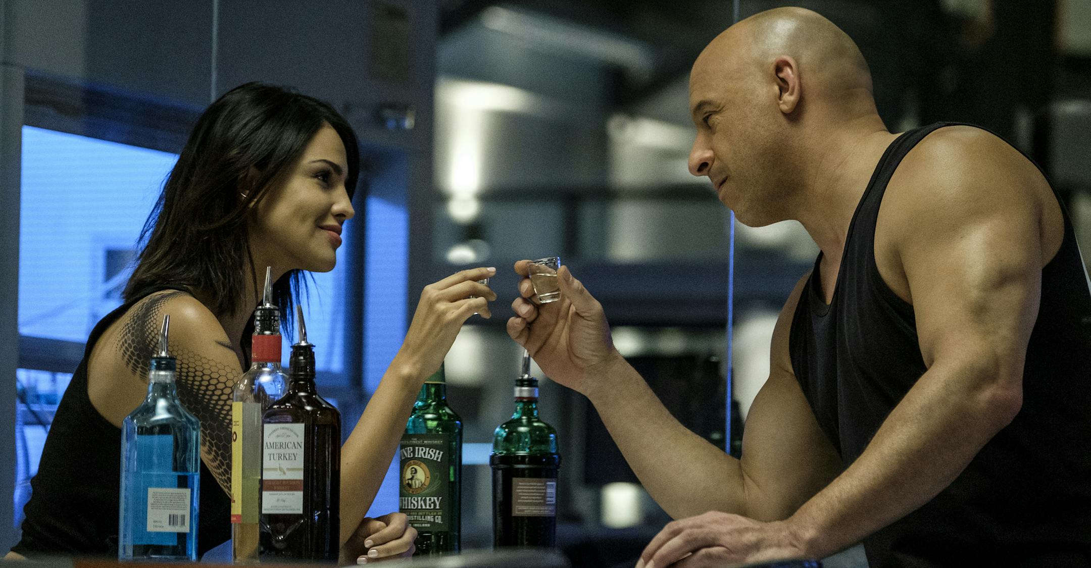 This image released by Columbia Pictures shows Eiza Gonzalez, left, and Vin Diesel in a scene from "Bloodshot." (Graham Bartholomew/Sony/Columbia Pictures via AP)