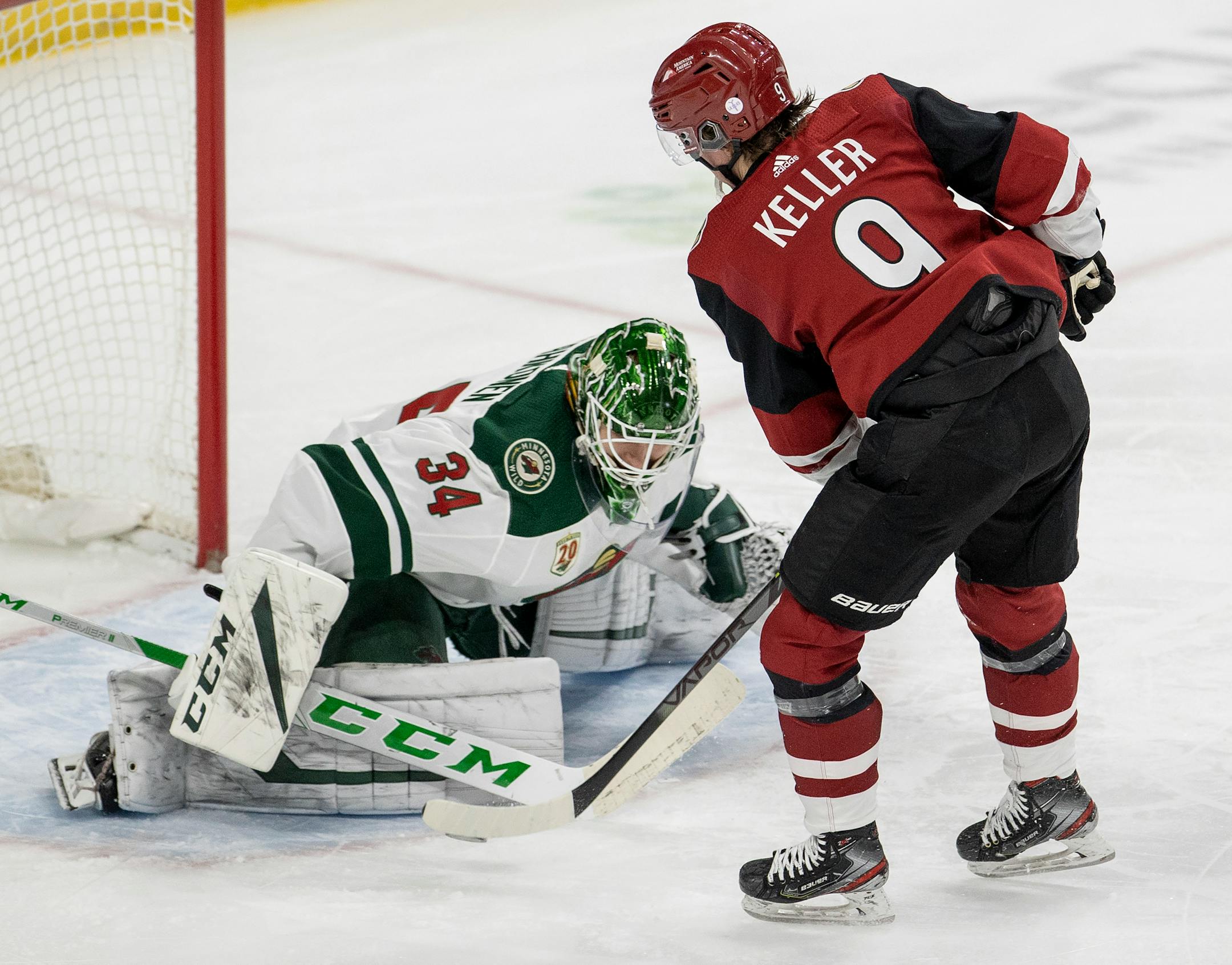 Minnesota Wild goalie Kaapo Kahkonen (34) made save on a shot by Clayton Keller (9) of the Arizona Coyotes in the second period.