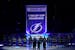 The Tampa Bay Lightning raise their 2020-2021 Stanley Cup Champions banner before an NHL hockey game against the Pittsburgh Penguins Tuesday, Oct. 12,
