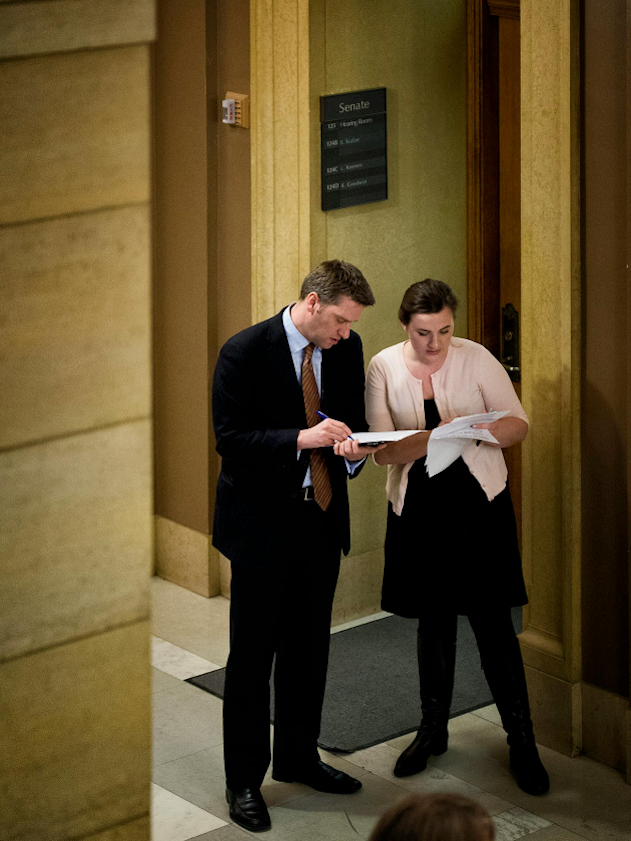 Minority Leader Kurt Daudt and Susan Closmore, went over notes in the hallway before rebutting the House DFLers budget plan to the press.   House Democrats want those making more than $500,000 to come up with about $854 million over the next two years, paying back K-12 public schools.   Tuesday, March 19, 2013.   ]   GLEN STUBBE * gstubbe@startribune.com
