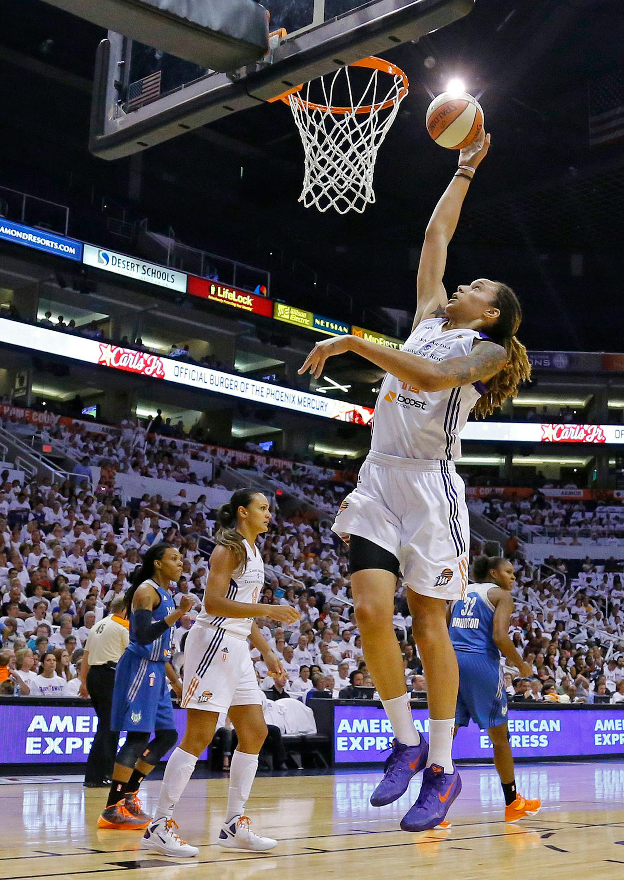 Phoenix Mercury center Brittney Griner (42) goes up for shot against the Minnesota Lynx during the first half of Game 1 of the WNBA Western Conference finals Friday, Aug. 29, 2014 in Phoenix, Ariz.
