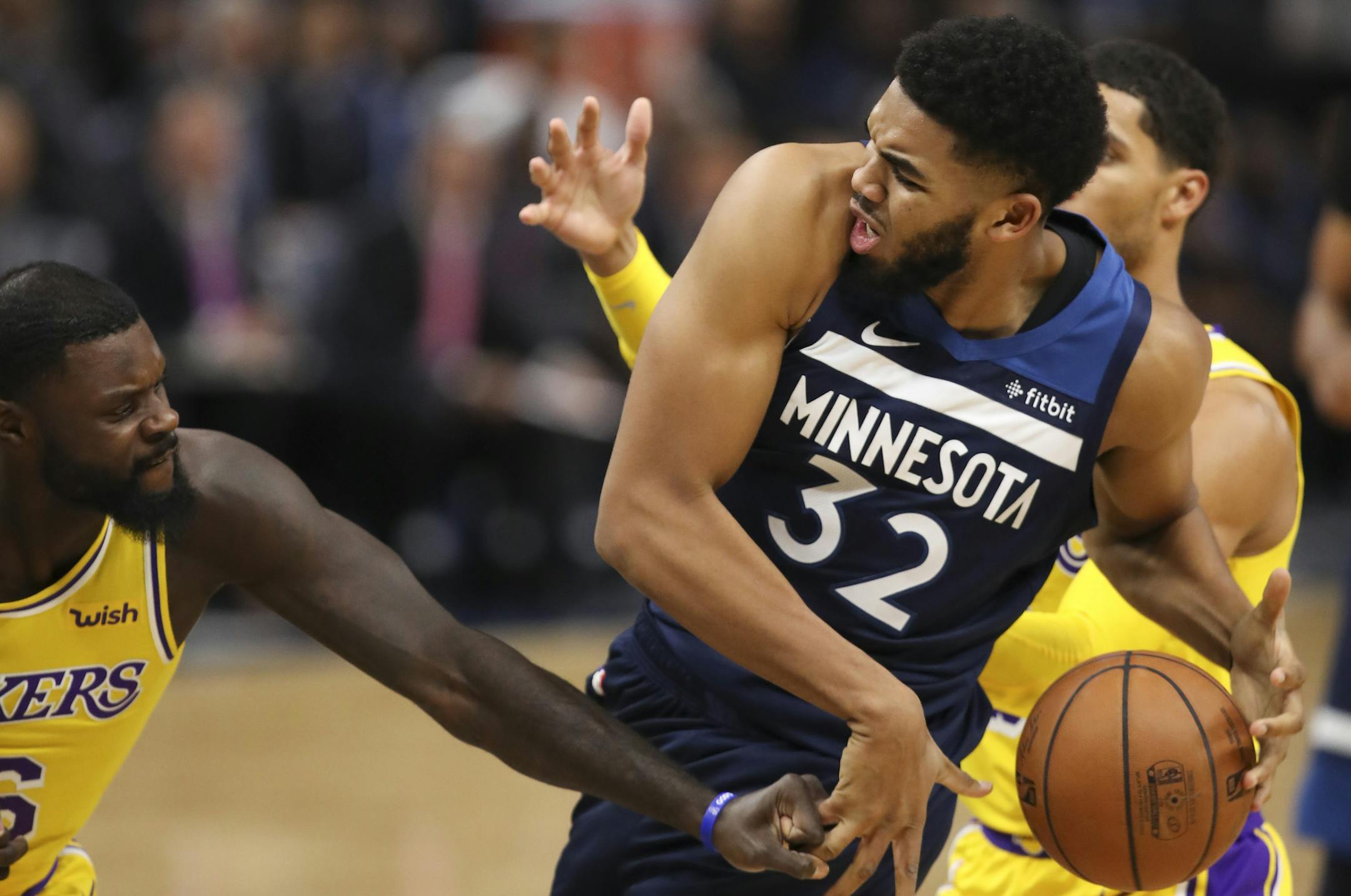 Los Angeles Lakers guard Lance Stephenson (6) grabbed Minnesota Timberwolves center Karl-Anthony Towns' finger after they fought for a rebound in the third quarter. ] JEFF WHEELER &#xef; jeff.wheeler@startribune.com The Minnesota Timberwolves beat the Los Angeles Lakers 124-120 in an NBA basketball game Monday night, October 29, 2018 at Target Center in Minneapolis.