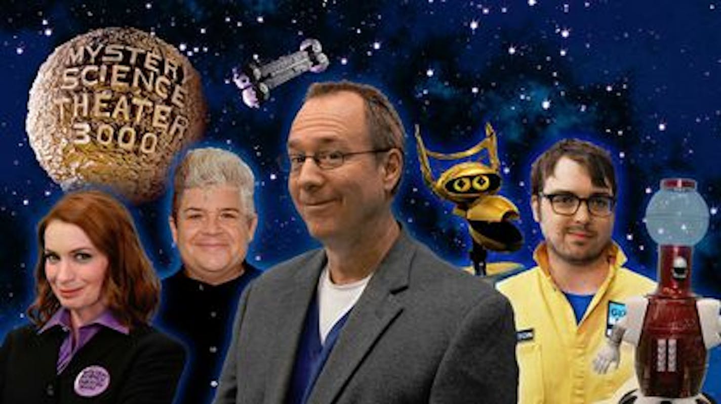 Joel Hodgson, center, is putting the "Mystery Science 3000" team back together for a streaming special Sunday.