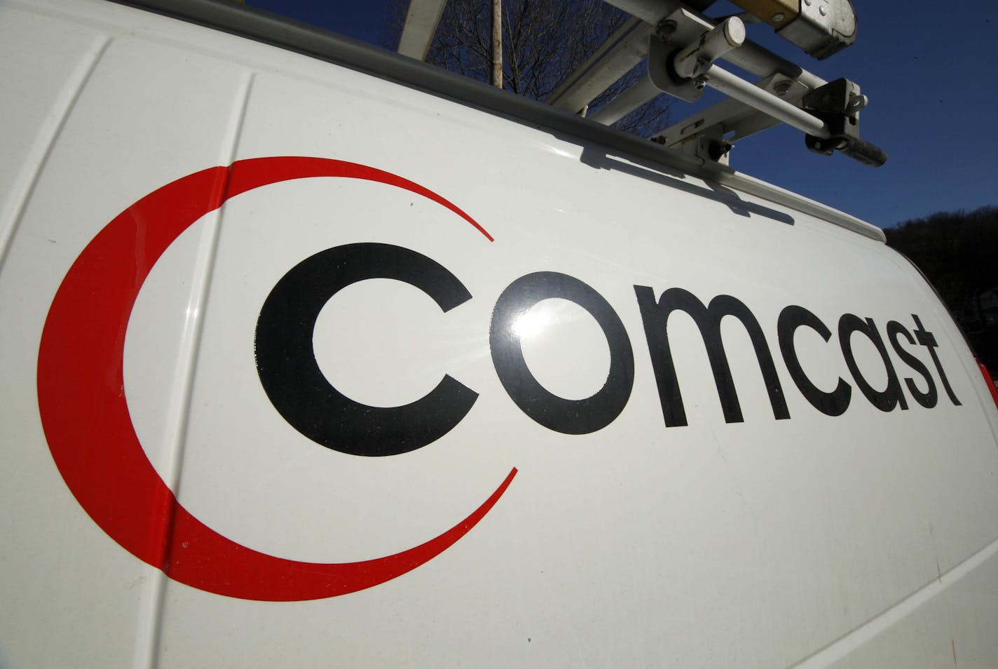 This Feb. 11, 2011 file photo shows the Comcast logo on one of the company's vehicles, in Pittsburgh.