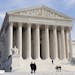FILE - In this Jan. 25, 2012 file photo, the U.S. Supreme Court Building is seen in Washington. The health insurance industry is spending millions to 