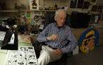 Artist/author Dick Locher, who has drawn the Dick Tracy comic strip since 1983, sits in his Naperville, Illinois home and studio, January 27, 2011. He