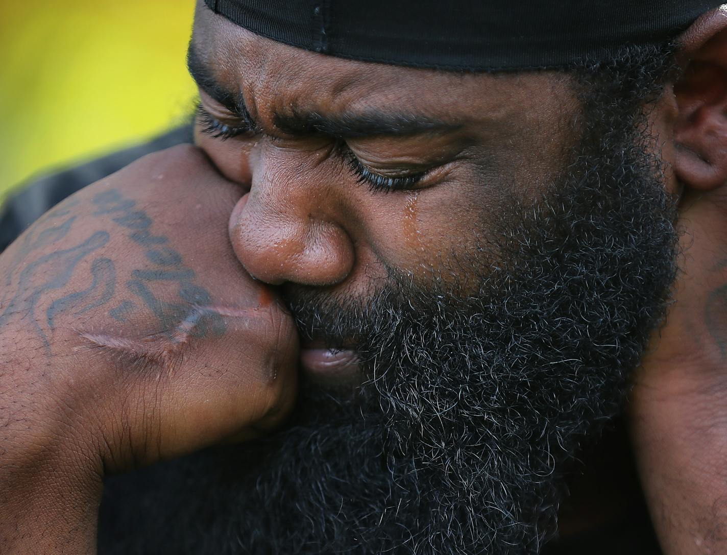 Brandon O'Neil Abrams, 31, became emotional when listening to his newfound friend Brandon Harrison, 35, talk about his journey to homelessness from Logan Park Tuesday in Minneapolis. Both men are homeless and have been staying in parks and sleeping in a tent but with winter not far off they are contemplating what might come next for them.] DAVID JOLES • david.joles@startribune.com Standalone feature photo Wednesday, Oct. 7, 2020, in Minneapolis, MN The remaining encampments in the city's parks h