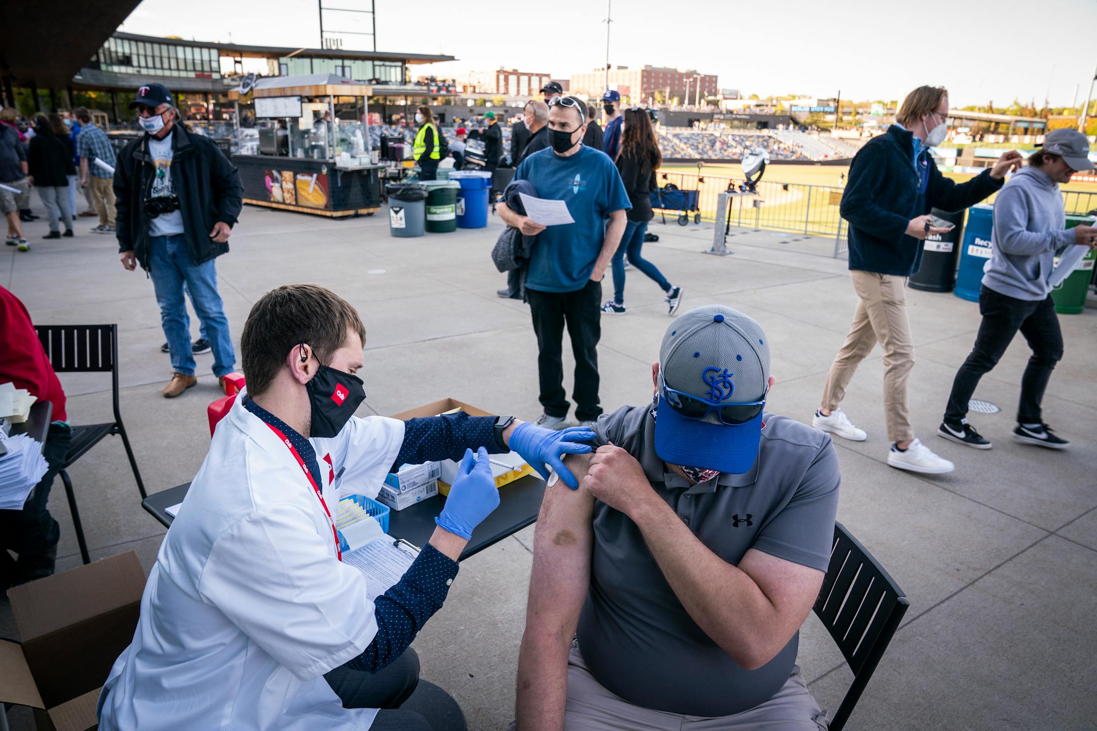 Matt Anderson of West St Paul got the Johnson &amp; Johnson COVID-19 vaccine at the St. Paul Saints home opener in St. Paul on Tuesday.