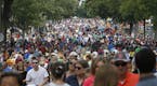 Thousands packed the Minnesota State Fair Friday, Aug. 26, 2016, in Falcon Heights, Minn. (AP Photo/Jim Mone)