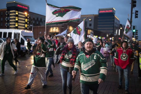 Minnesota Wild fans marched from Tom Reid's Hockey City Pub to Xcel Energy Center for the home opener on Oct. 12, 2019.