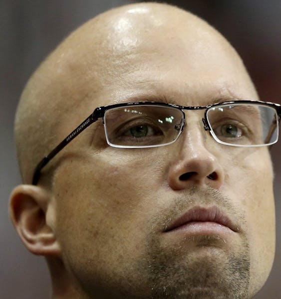 Minnesota Wild head coach Mike Yeo watches second-period action against the Colorado Avalanche in Game 6 of the NHL Western Conference quarterfinals a