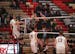 Lakeville South's Aiden Christensen (22), had his attack denied by Osseo's Kirby Schmalz and Cameron Wresh, right, in a tournament game played in Apri