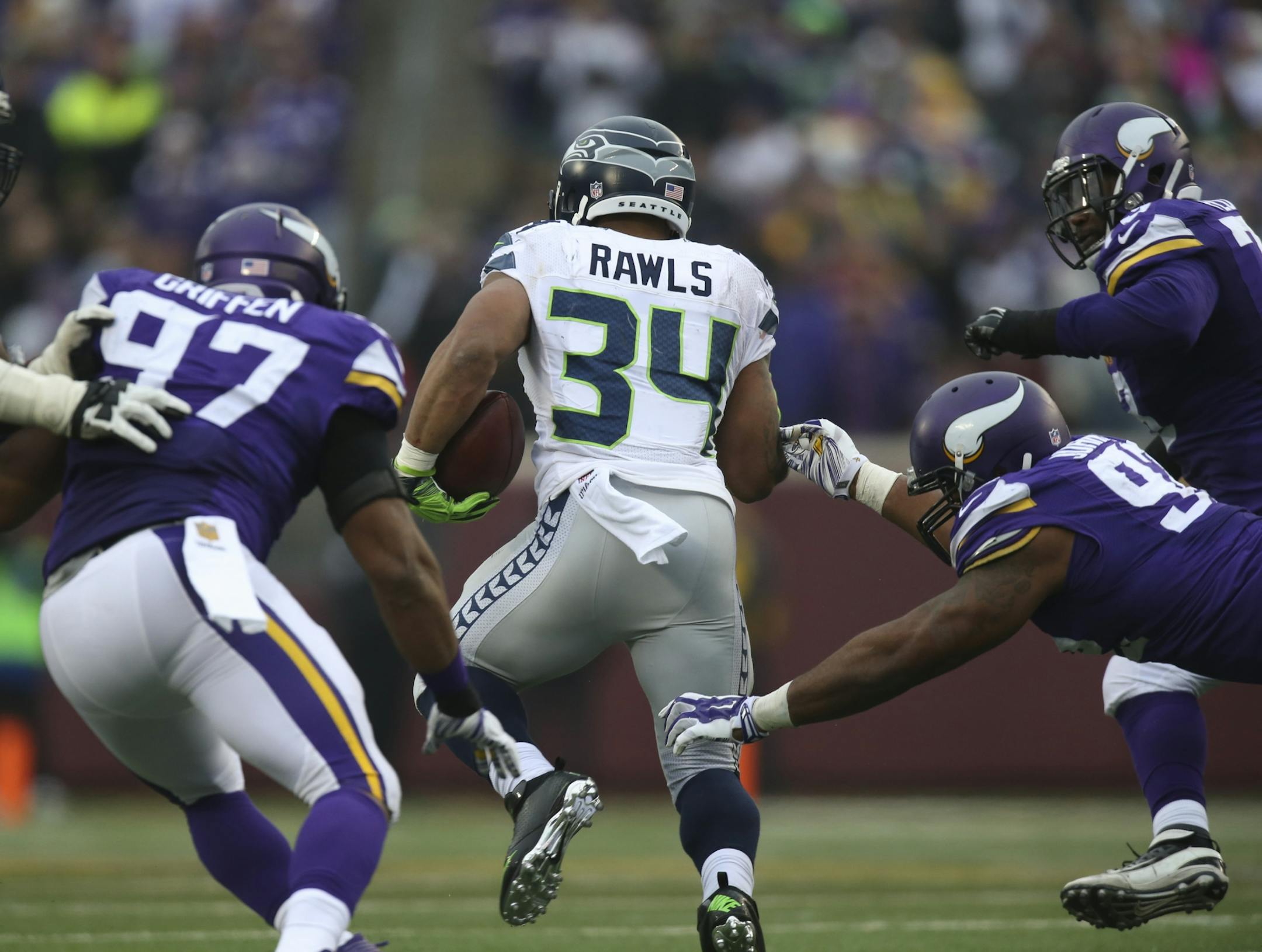 Seahawks running back Thomas Rawls (34) found a hole for a seven yard gain in the third quarter Sunday.