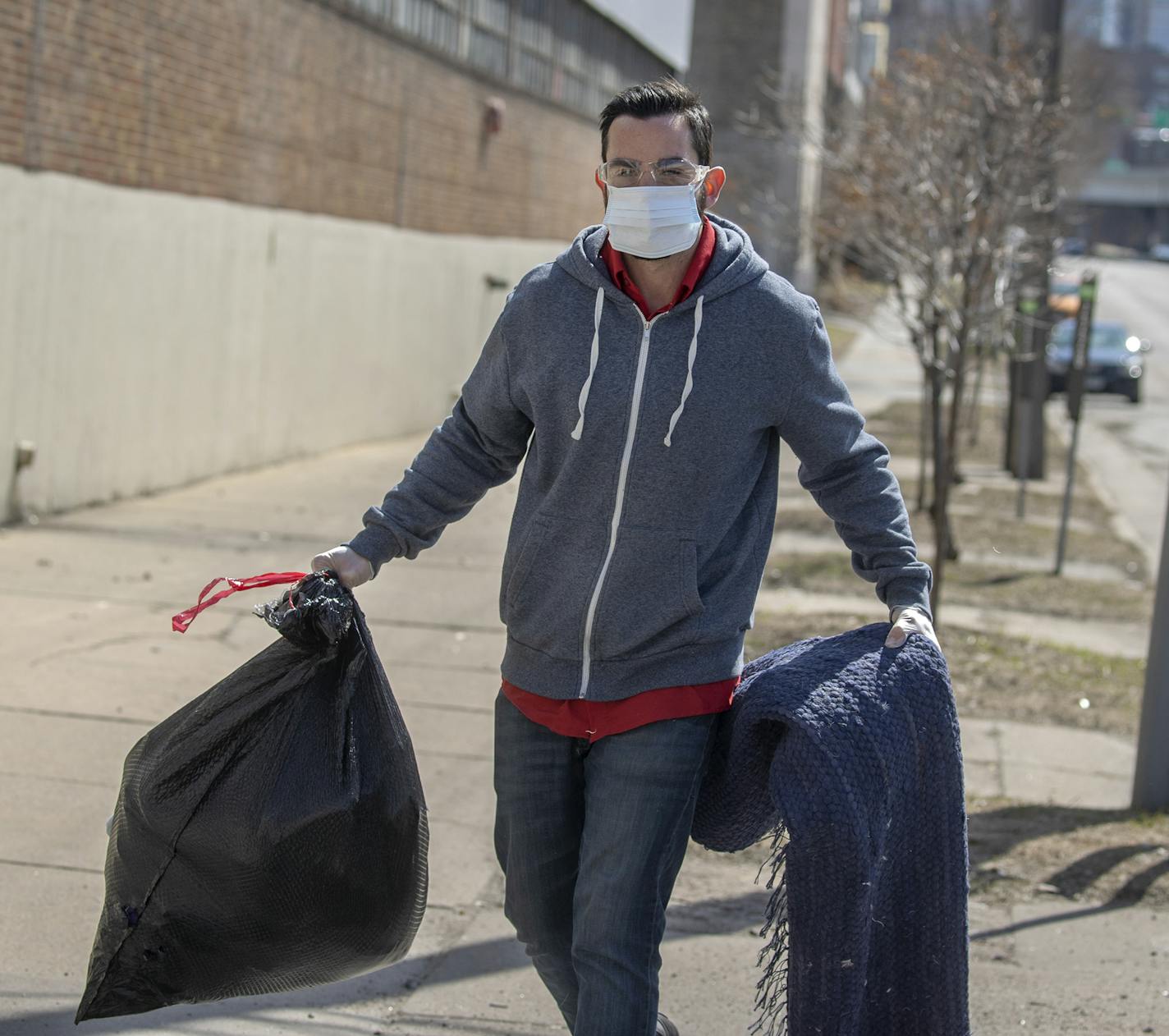 Salvation Army employee Sean Graham grabbed donations being dropped off to the donation center, Wednesday, April 1, 2020 in downtown Minneapolis, MN. Graham would place them in gaylords that would eventually be placed in a semi for quarantine. ] ELIZABETH FLORES &#x2022; liz.flores@startribune.com