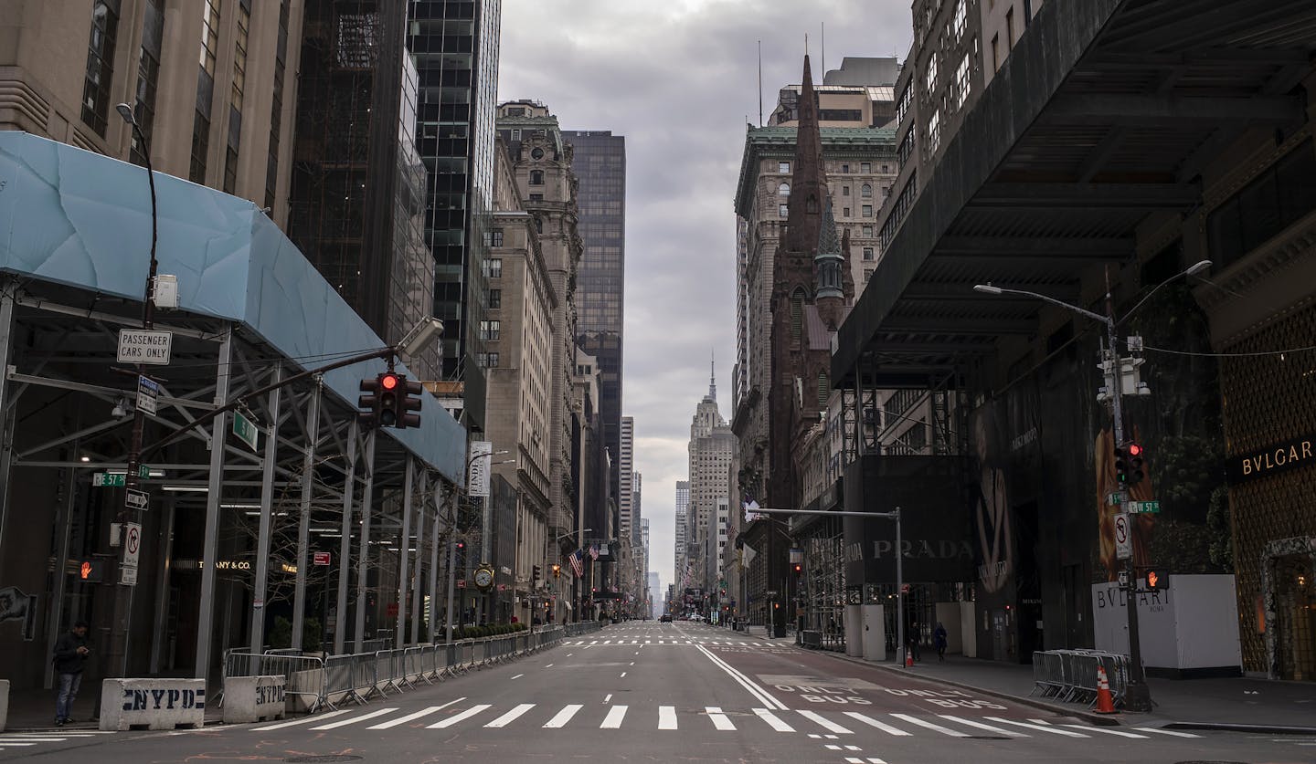 A view down Fifth Avenue in Manhattan, April 5, 2020. Faster buses. Plentiful parking. Cleaner air. A shift in habits offers a glimpse of what the city could be like without so much congestion. (Victor J. Blue/The New York Times)