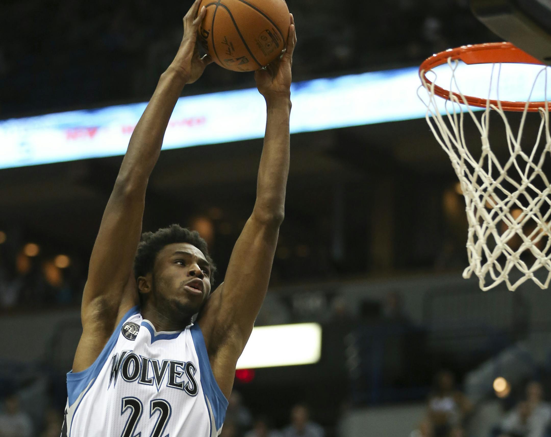 Timberwolves guard Andrew Wiggins dunked over Sacramento Kings forward Quincy Acy in the first quarter Wednesday night. ] JEFF WHEELER ï jeff.wheeler@startribune.com The Minnesota Timberwolves faced the Sacramento Kings in an NBA basketball game Wednesday night, March 23, 2016 at Target Center in Minneapolis.