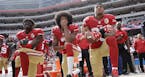 FILE - In this Oct. 2, 2016 file photo, from left, San Francisco 49ers outside linebacker Eli Harold, quarterback Colin Kaepernick and safety Eric Rei