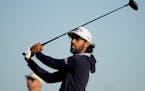 Akshay Bhatia watches his tee shot on the 11th hole during the second round of the Texas Open.