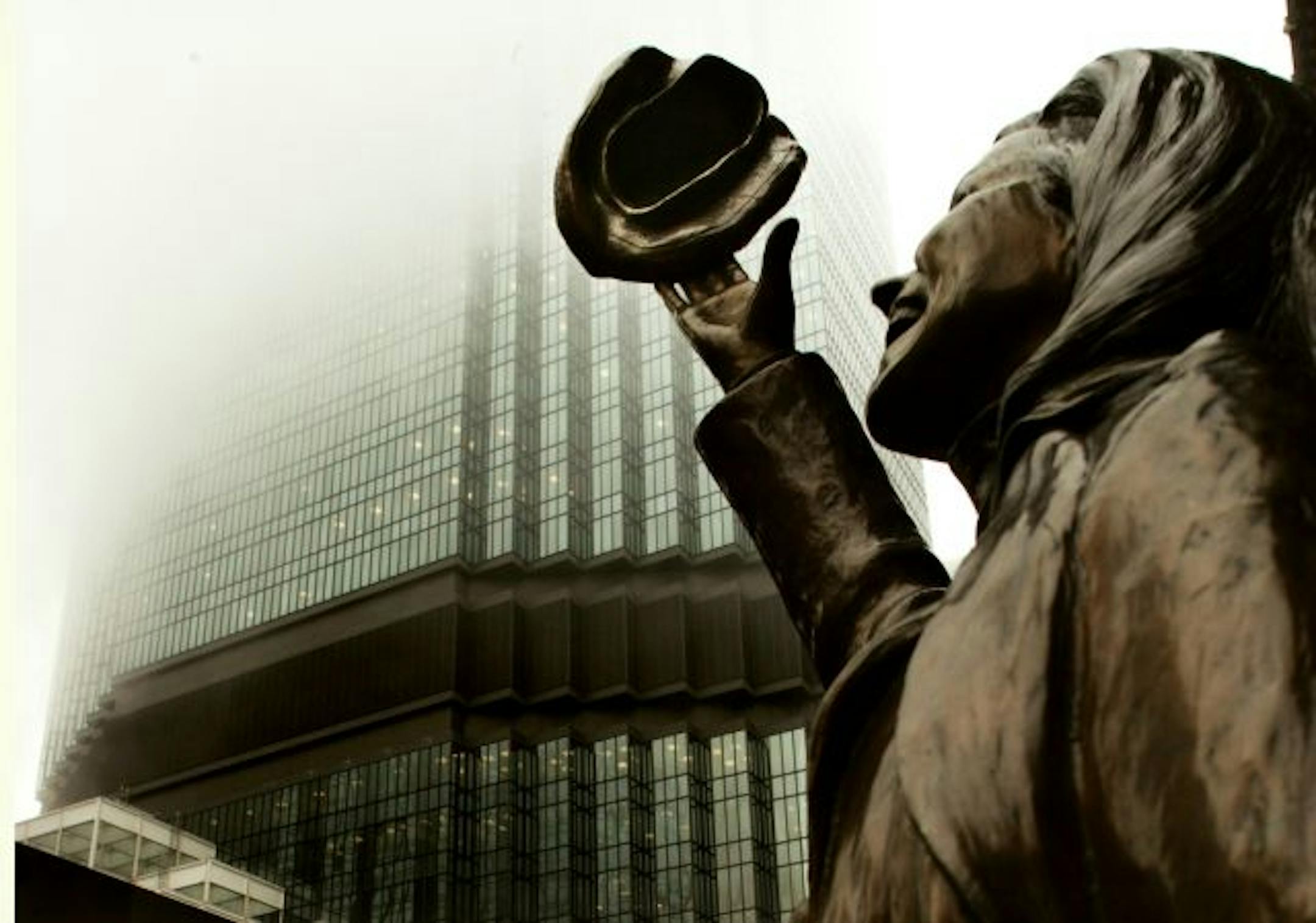 Mary Tyler Moore with the IDS Tower. Photographed at Nicollet Avenue South and 7th Street on a very foggy winter morning.