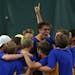 Wayzata celebrated with teammate Jake Strom after he and Steele Kowalczyk won the doubles match winning the state tournament.