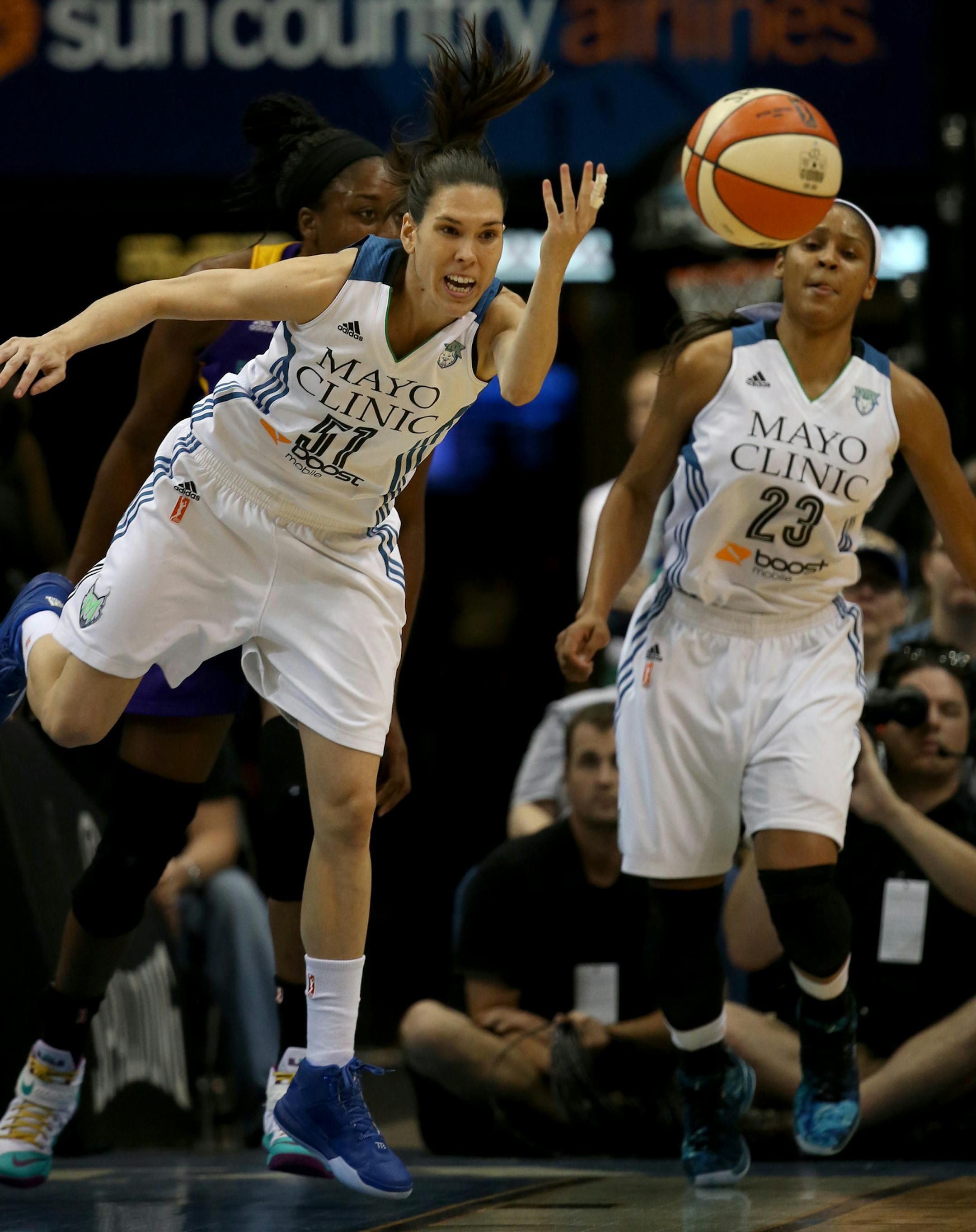 Lynx Anna Cuz stretched out to grab a loose ball during the first quarter. ] (KYNDELL HARKNESS/STAR TRIBUNE) kyndell.harkness@startribune.com Lynx vs LA Sparks during the first round of the WNBA Playoffs at Target Center in Minneapolis Min., Friday September 18, 2015.