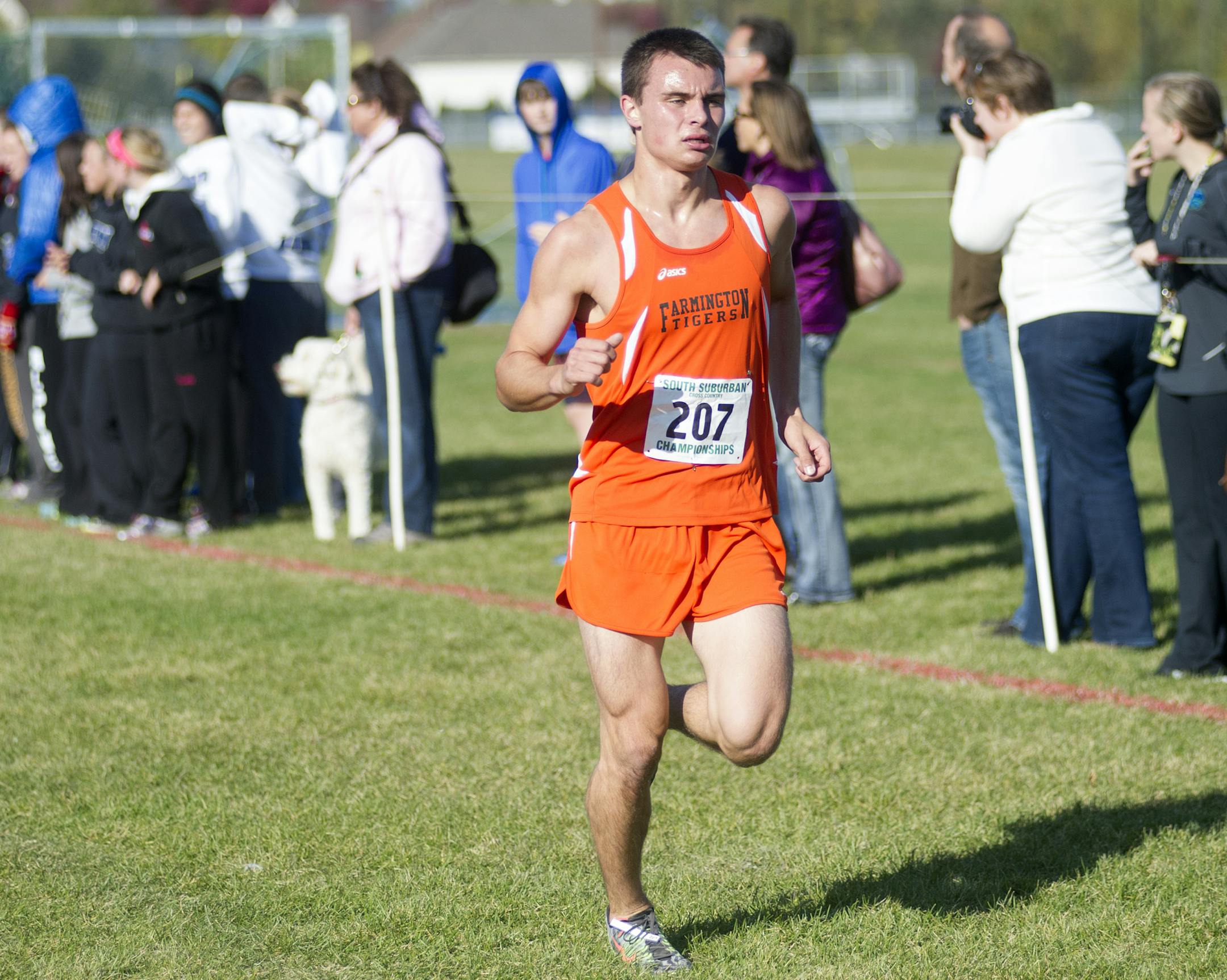 Farmington's Justin Hyytinen dug deep as he approached the finish line during the South Suburban Conference meet Friday at Eagan High School.