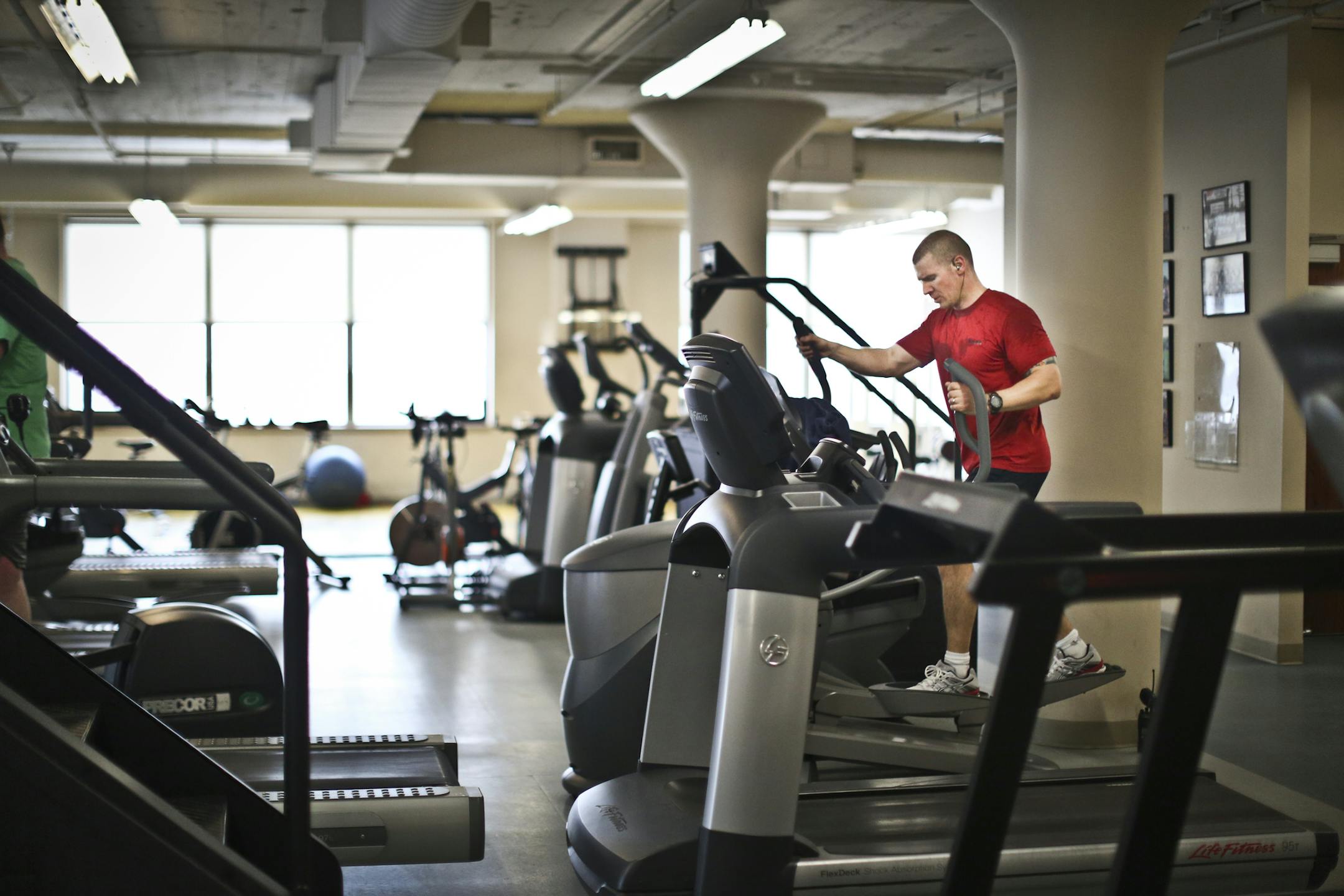 St. Paul police officer Mitch Schuck did a cardio workout at the department gym on Friday, March 15, 2013, in St. Paul, Minn. ] (RENEE JONES SCHNEIDER * reneejones@startribune.com)