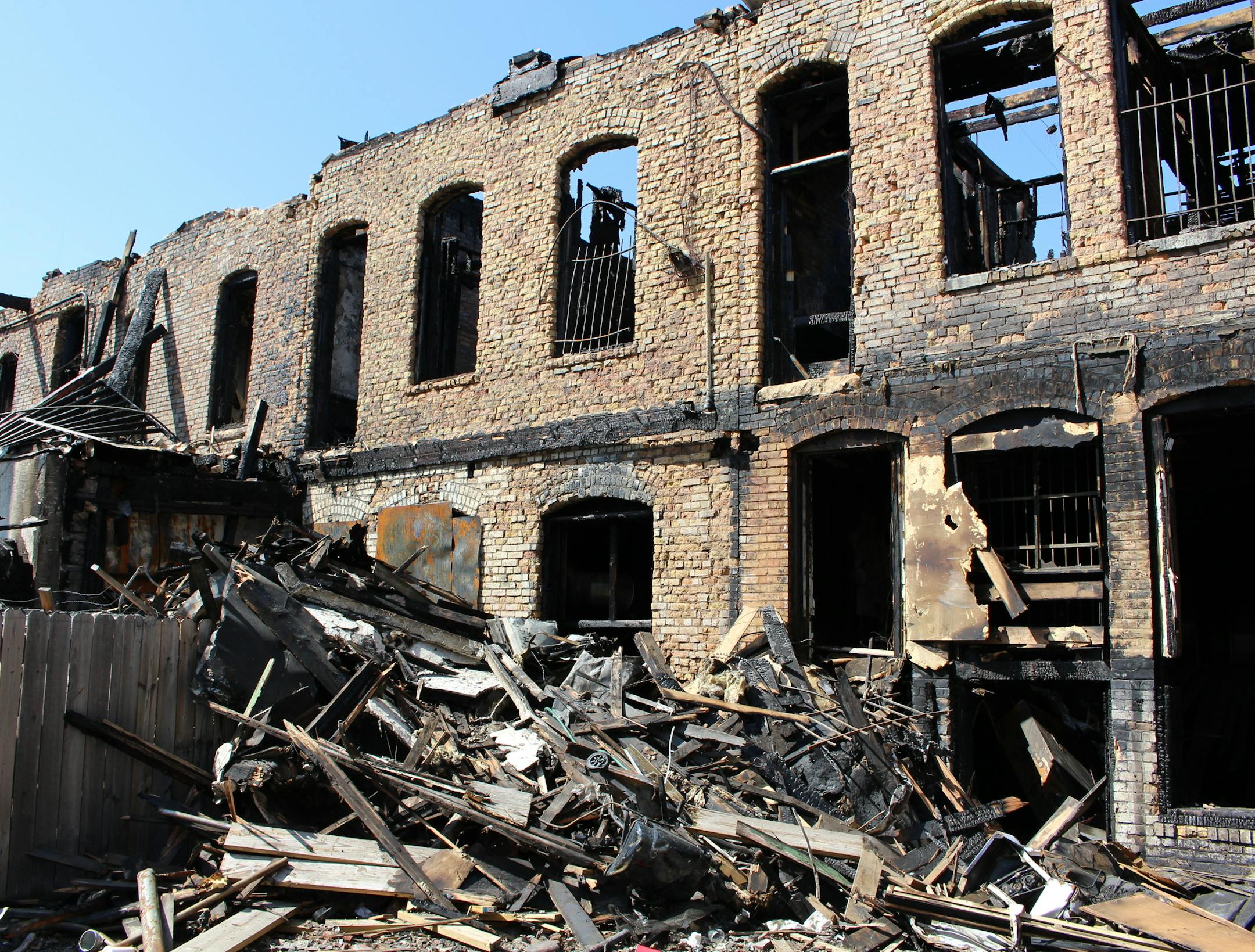 An exterior view of the buildings damaged by fire on West Broadway.