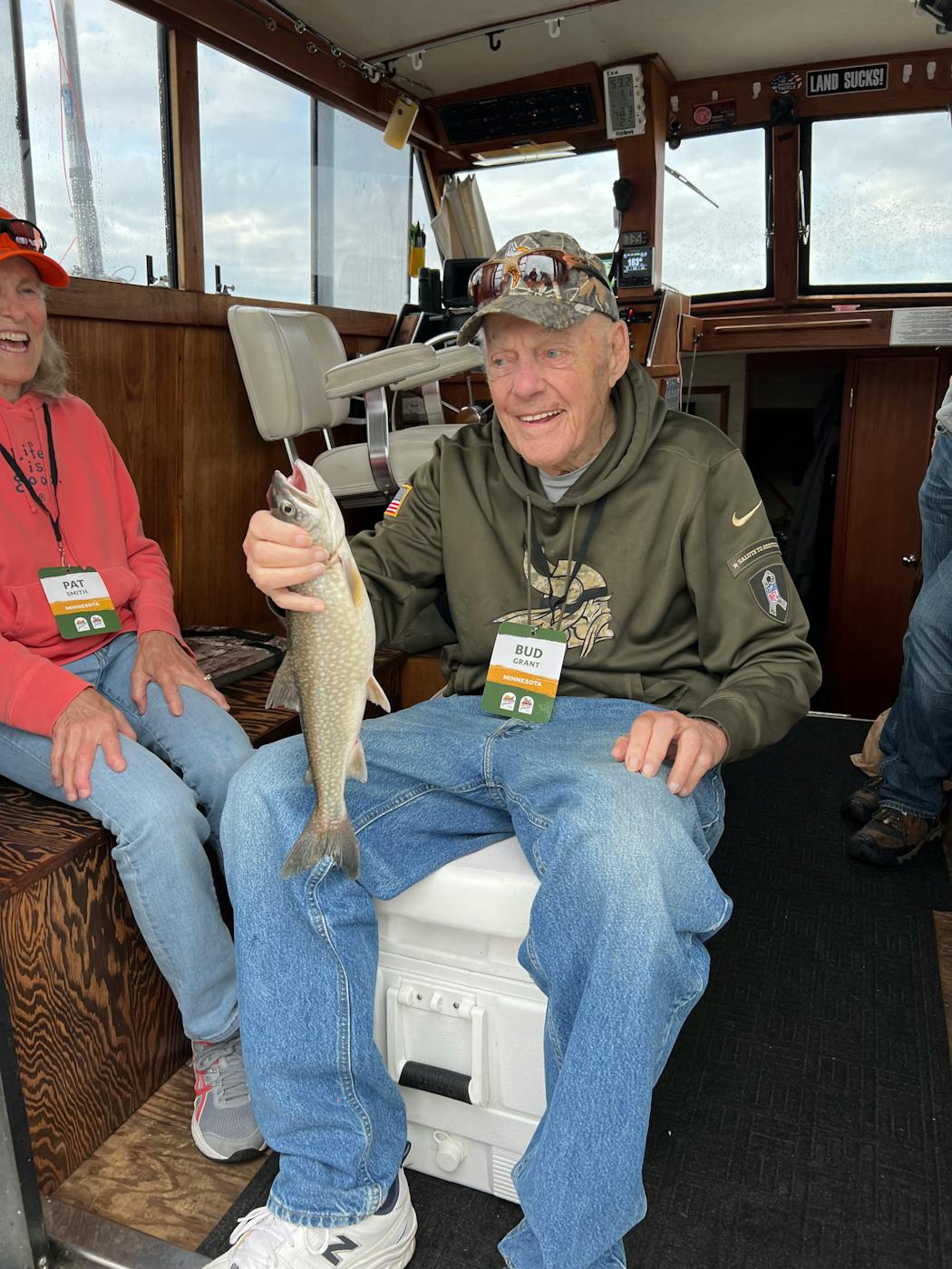 Bud Grant with a lake trout he caught in Lake Superior