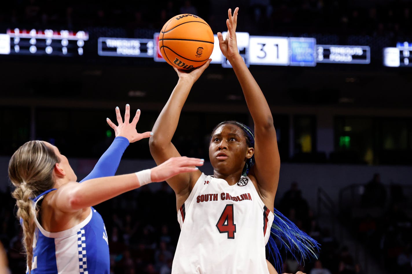 South Carolina forward Aliyah Boston (4) shoots over Kentucky guard Maddie Scherr, left, during the first half of an NCAA college basketball game in Columbia, S.C., Thursday, Feb. 2, 2023. (AP Photo/Nell Redmond)