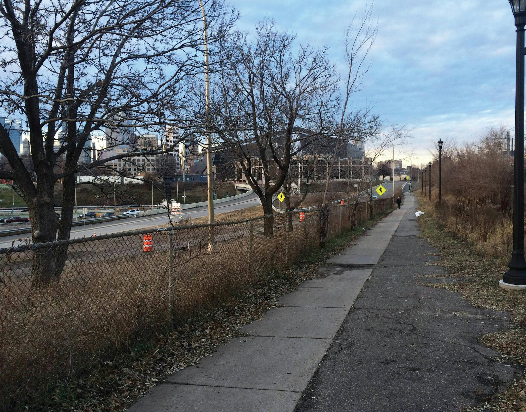 Before and after renderings of the proposed Samatar Crossing, which would replace a freeway ramp near Cedar-Riverside.